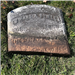 Photo of broken headstone that was buried under the sod - Youngs Cemetery