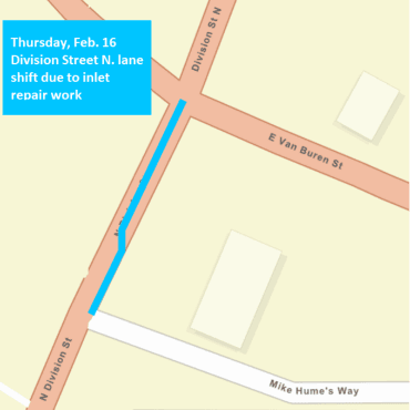 A city street map showing the lane shift on Division Street N. as a light blue, solid line.