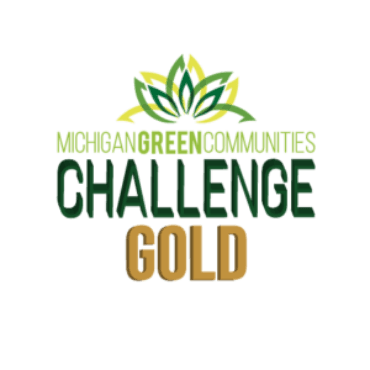 The Michigan Green Communities gold seal logo.
