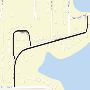 A city street map showing the paving projects on both Honey Lane and Kelwood Lane as black lines.